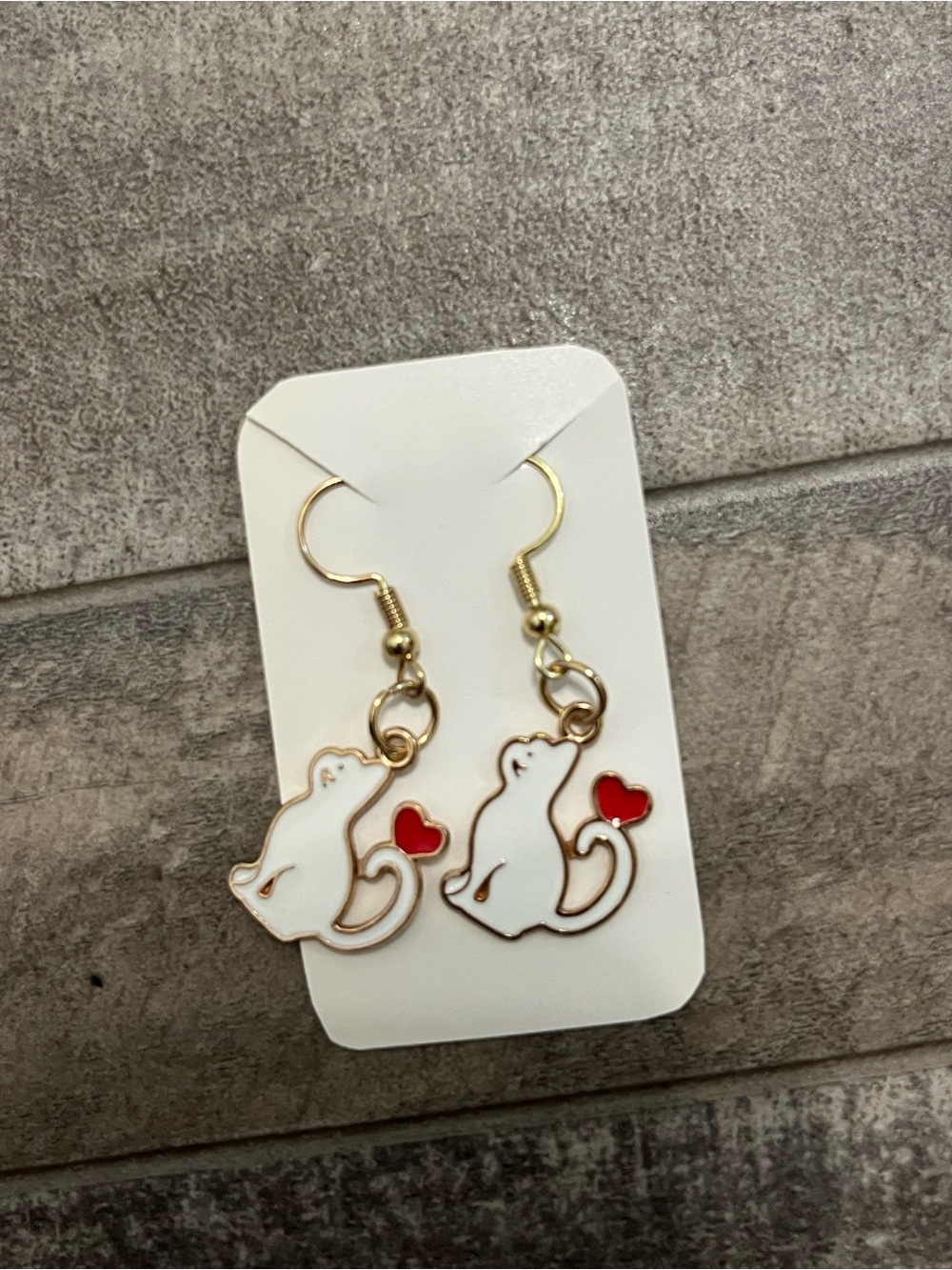 Gold-Tone White Cat Drop Earrings with Red Heart Accent